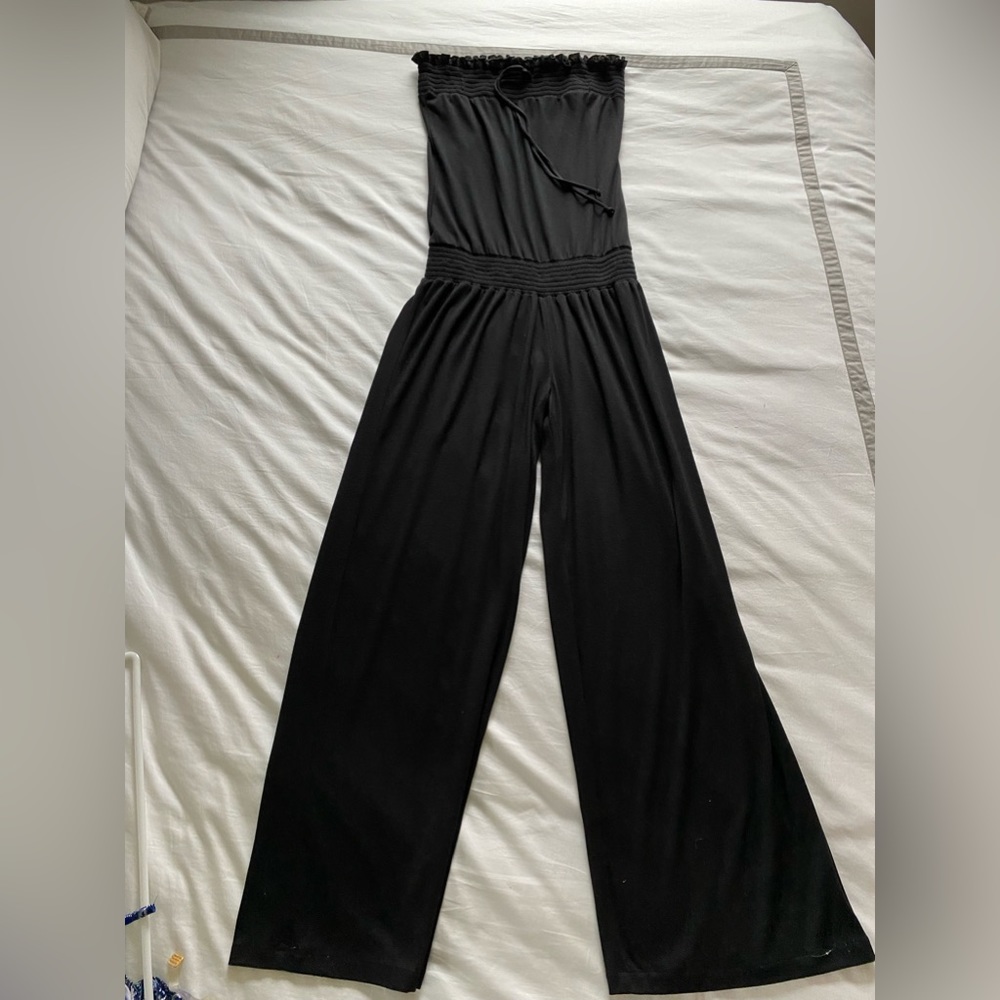 Black cotton jumpsuit.